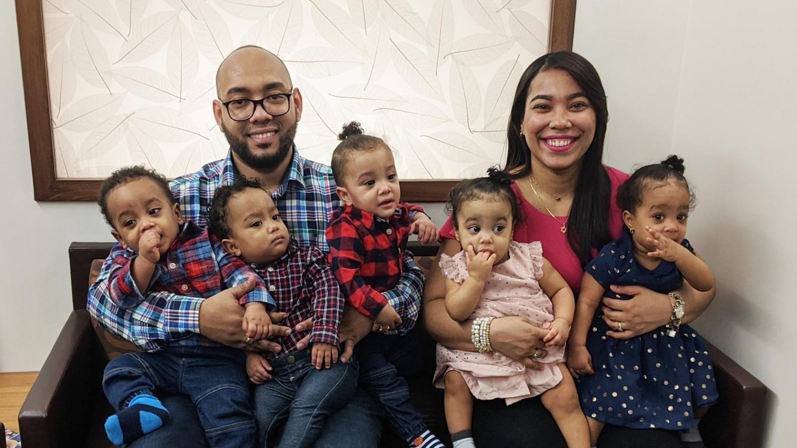 Mom and dad Christopher and Arlette Rivera and with their five children