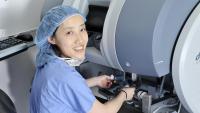 Dr. Jeannie Kim using specialized equipment